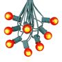 Picture of 100 G30 Globe String Light Set with Orange Satin Bulbs on Green Wire