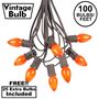 Picture of 100 C7 String Light Set with Orange Ceramic Bulbs on Brown Wire
