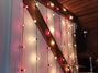 Picture of 100 G30 Globe String Light Set with Frosted White Bulbs on Black Wire