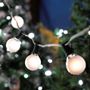 Picture of 25 G40 Globe String Light Set with Frosted White Bulbs on Black Wire