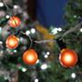 Picture of 25 G40 Globe String Light Set with Orange Satin Bulbs on Black Wire