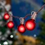 Picture of 25 G40 Globe String Light Set with Red Satin Bulbs on Brown Wire