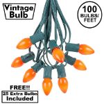 100 C7 String Light Set with Orange Ceramic Bulbs on Green Wire